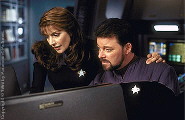 Troi and Riker are studying the files of the So'na