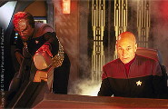 Captain Picard and Worf are fighting against Data
